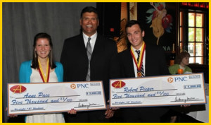 2012 Straight 'A' winners Anne Pace of Seton High School and Robert Pieper of Eaton High School stand with Anthony Munoz 