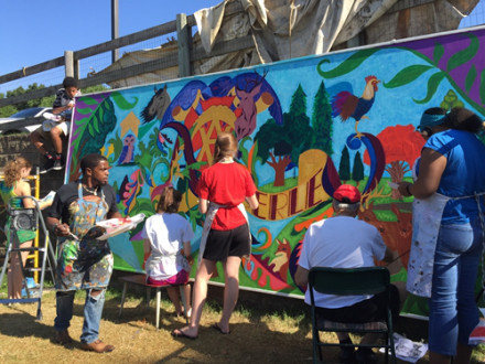 To celebrate its 75th anniversary, Amberley Village in Cincinnati worked with artist Cedric Michael Cox and residents to create this permanent mural.