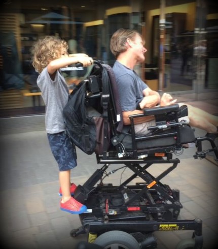 Steve Wampler teaches a child about disabilities