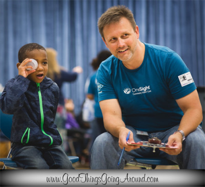OneSight volunteer David Brown helped provide free vision screenings to Cincinnati area students