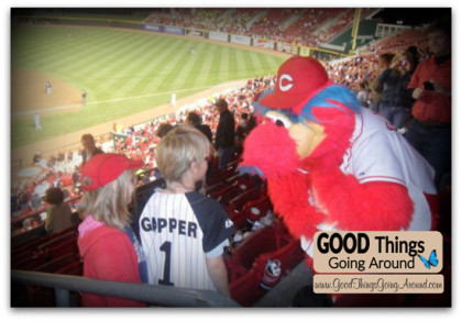 Cincinnati Reds mascot Gapper with a fan