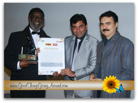 Pictured: Arzell Papazell Nelson receiving the "KARMAVEER PURASKAAR'S" GLOBAL AWARD for SOCIAL JUSTICE and CITIZEN ACTION and NOBEL LAURETTE under the GLOBAL ARTISTES 4 CHANGE MUSIC category for 2011.